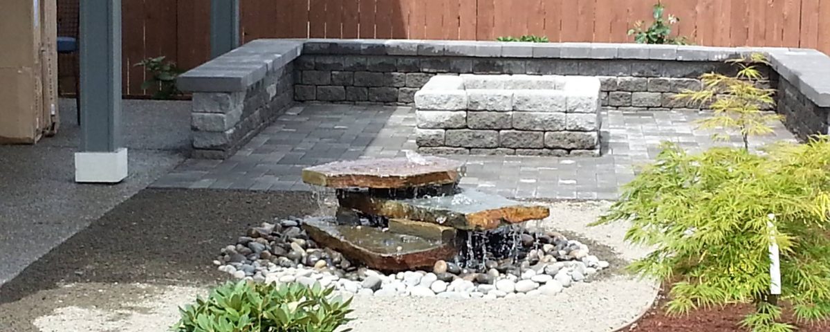 ponds waterfalls and water features-new home landscaping-outdoor living clark county washington- patios- waterfeatures- seat wall